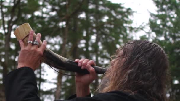 Viking Man Blows His Horn — Stock video