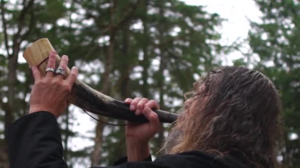 Viking Man Blows His Horn — Vídeo de stock