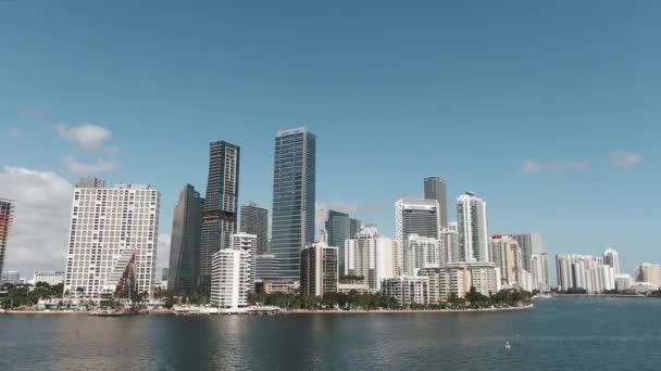 Wide Aerial View Brickell Waterfront Downtown Miami Flying Out Water — Vídeos de Stock