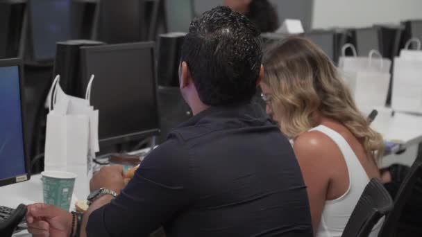 Couple Attending Conference Sat Desks Taking Notes — Stockvideo