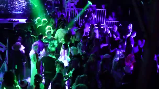 Young People Dancing Club Flashing Purple Lights — Stockvideo