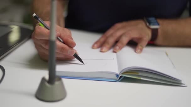 Graphic Designer Sketching Notebook — Vídeo de Stock