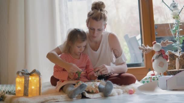 Mother Lovely Daughter Sitting Together Wrapping Christmas Gifts Girl Scissor — Stock video