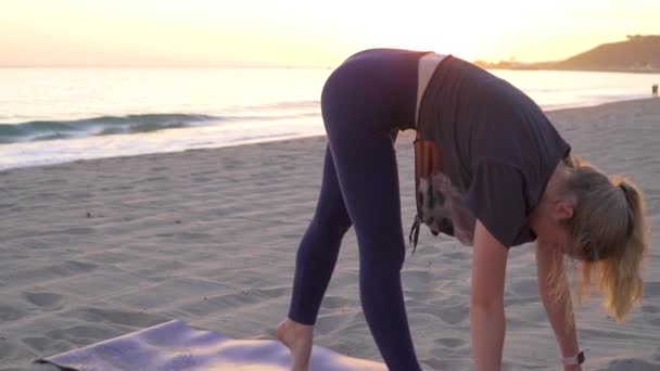 Female Performing Yoga Moves Beach Sunset — стоковое видео