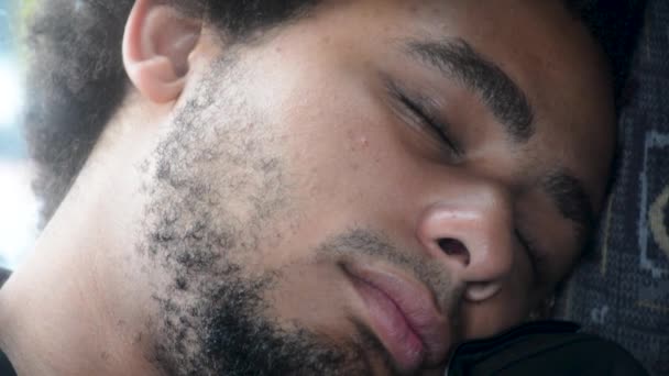 Young African American Black Man Sleeps Bus Chair Extreme Close — стокове відео