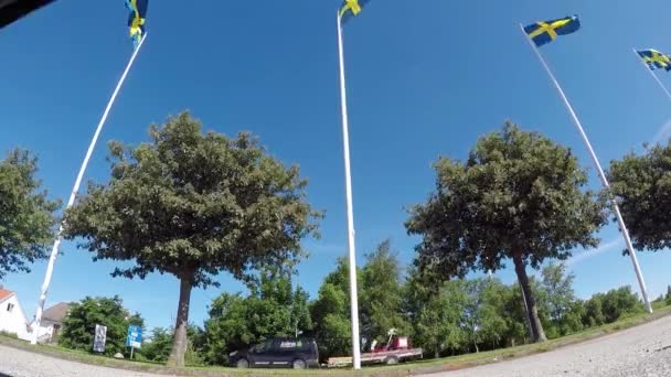 Car Drives Camera Standing Ground Frog Perspective Blue Sky Swedish — Video