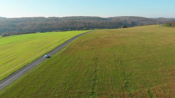 White Car Driving Scenic Landscape Autumn Colours — Stockvideo