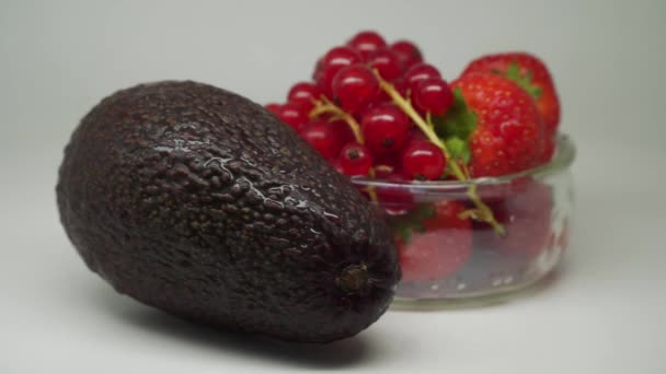 Delicious Ripe Fruits Cherries Strawberry Small Transparent Bowl Avocado Rotating — Stock videók