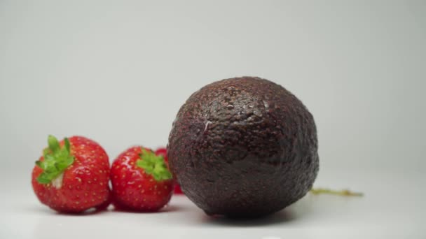 Avocado Strawberries Red Currants Set Delicious Fresh Fruits Dessert Close – stockvideo