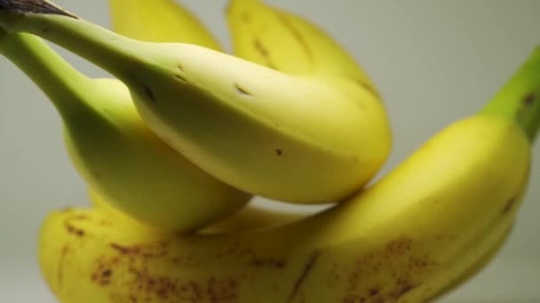 Yellow Ripe Bananas Pure White Background Close Shot — стоковое видео