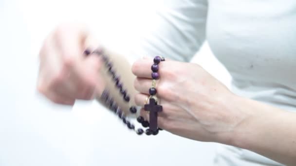 Woman Praying Holding Cross Her Hands White Background Stock Video — Stock video