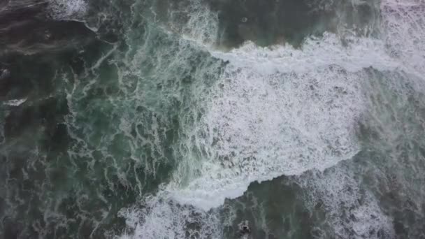 Churning White Breaking Waves Move Slowly Shoreward Vertical Aerial — Stockvideo