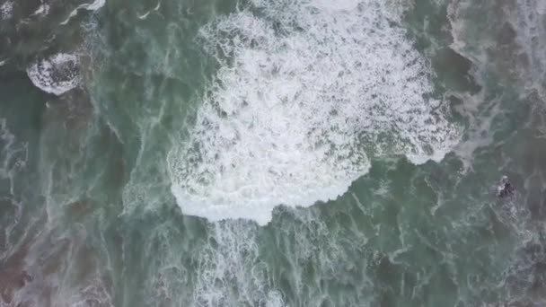 Churning White Foamy Waves Move Slowly Shoreward Vertical Aerial — Stock video