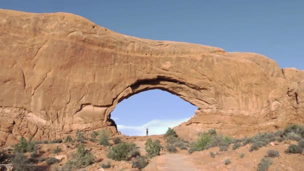 Tiny Person Standing North Window Arches National Park Utah Slow — Vídeo de Stock