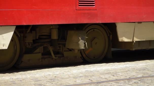 Wheels Red Tram Stopping Close Slow Motion — Vídeos de Stock