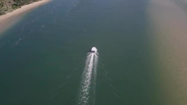 White Tour Boat Slowly Navigates Shallow Lagoon Aerial — Stock video