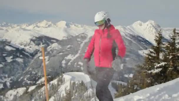 Female Throwing Snowball Top Mountains — ストック動画