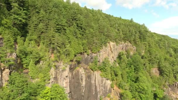 Vertical Cliffs Covered Pine Forests Canada Blue Sky Few Clouds — Vídeos de Stock