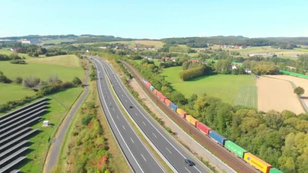 Freight Train Containers Passing Landscape — Αρχείο Βίντεο