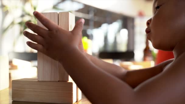 Side View Young South African Boy Playing Blocks — Stock Video
