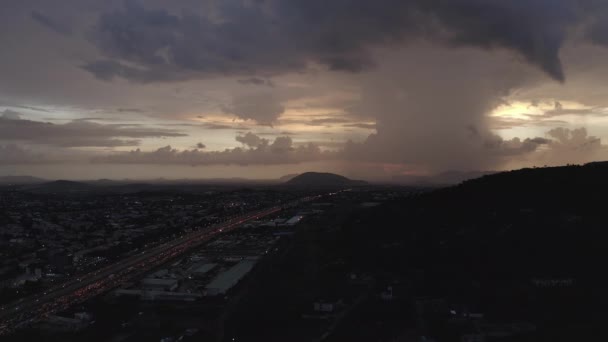 Aerial Fairly Stationary Shot Highway Leading Hill Heavy Clouds Horizon — Stok Video