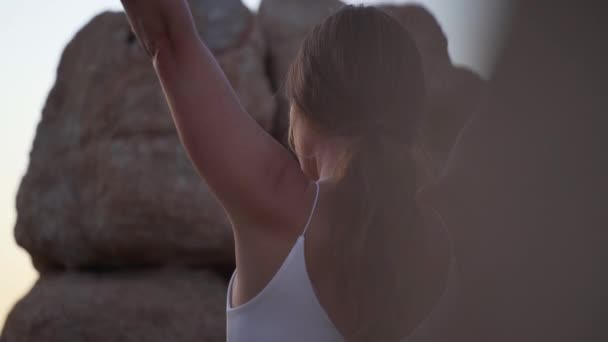 Girl Tattoo Her Arm Doing Stretch Rock Sunset Joshua Tree — Stockvideo