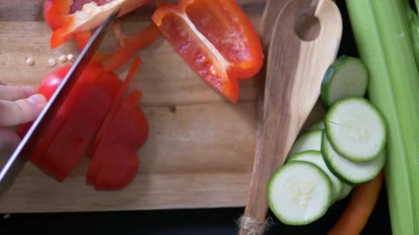 Close Topview Shot Woman Cutting Ripe Juicy Red Pepper Wooden — Stock Video