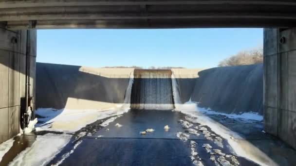 Drone Flying Bridge Dam Spillway Out Partially Frozen Lake Winter — Stock Video