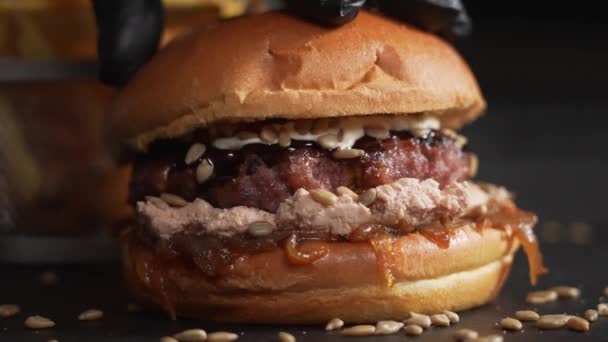 Chef Hand Pressing Juicy Burger Dripping Sauce Slow Motion Satisfying — Stock Video