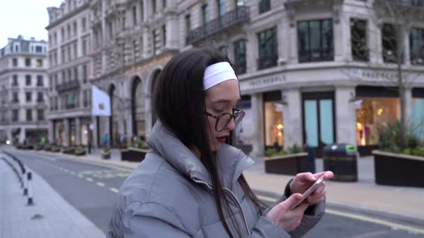 Beautiful Young Woman Taking Selfie Soho London Medium Shot — стоковое видео