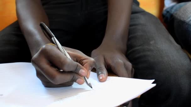 Close Hand Young Man Writing Seminar Kibera Nairobi Kenya — Vídeo de Stock