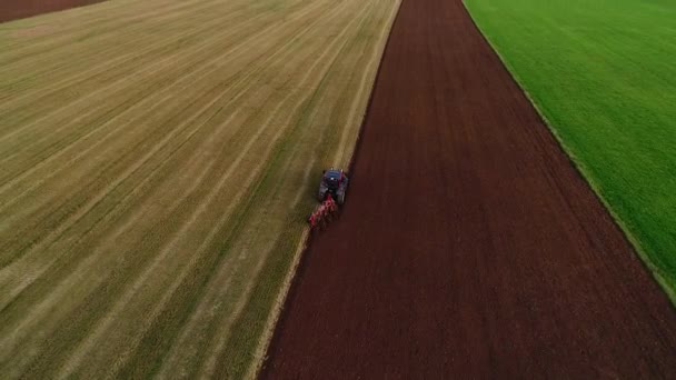 Agroculture Field Ploughing Four Furrow Reversible Plough Aerial Wide View — Stock Video