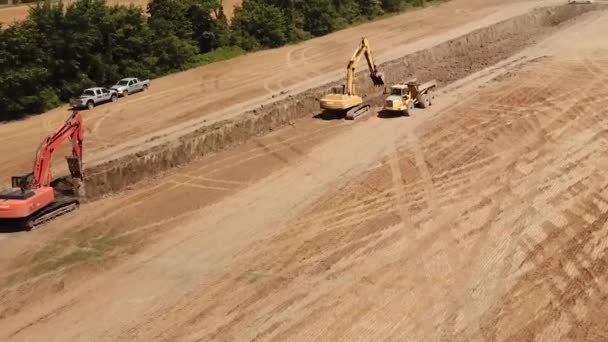 Aerial Shot Multiple Excavators Dump Trucks Operating Together Construction Site — Video Stock