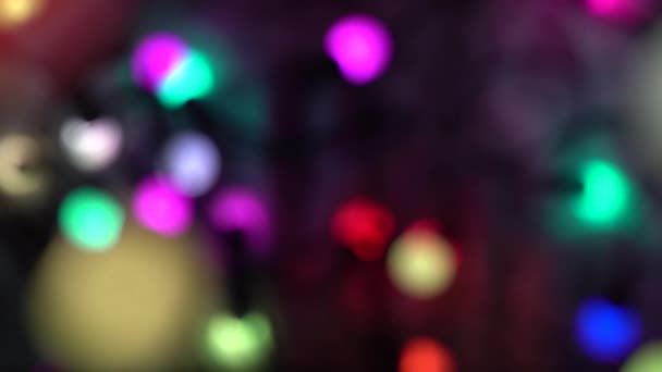 Abstract Focusing Blurred Christmas Lights Bokeh Background Blinking Christmas Tree — стоковое видео
