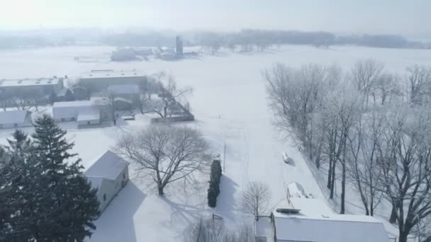 Aerial View Early Morning Sunrise Snow Fall Amish Countryside Senn — kuvapankkivideo