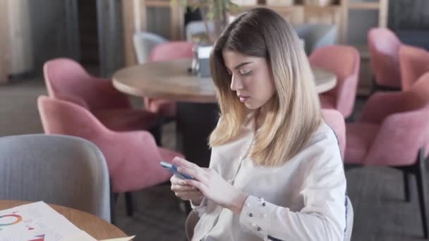 Calm Young Woman Using Smartphone Cafe — Stok Video