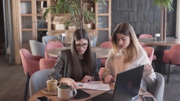 Two Charming Women Sitting Cafe Dealing Some Business Women Talking — Stock Video
