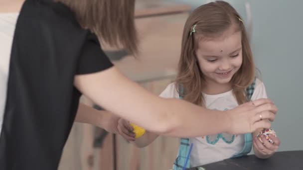 Young Mother Taking Photo Her Beautiful Little Daughter Who Holding — Stock video