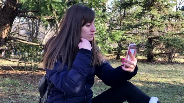 Slowmo Young Girl Taking Selfies Smartphone Using Front Camera Sitting — Vídeo de Stock