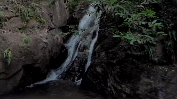 Slow Panning Backing Mouthing Waterfall Reveal Small Pond Wider Rocky — Stockvideo