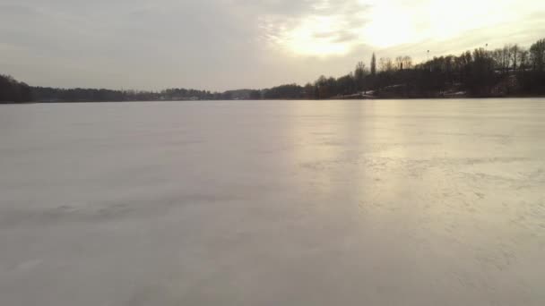 Aerial Flying Very Low Close Frozen Lake Surface Cloudy Day — стокове відео