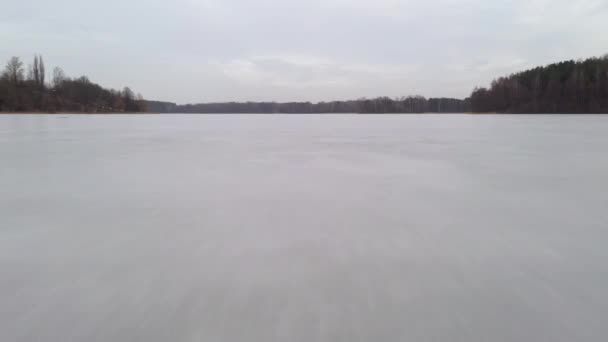Aerial Flying Very Low Close Frozen Icy Lake Surface Cloudy — Vídeos de Stock