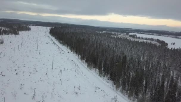 Cars Driving Snow Covered Landscape Kuusamo Finland Aerial Footage Shot — Video