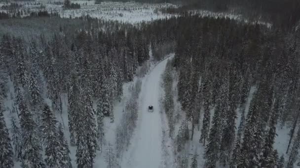 Cars Driving Snow Covered Landscape Kuusamo Finland Aerial Footage Shot — Stockvideo