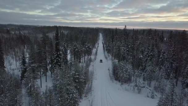 Cars Driving Snow Covered Landscape Kuusamo Finland Aerial Footage Shot — Stockvideo