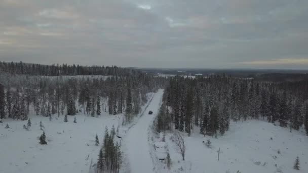 Cars Driving Snow Covered Landscape Kuusamo Finland Aerial Footage Shot — Vídeos de Stock