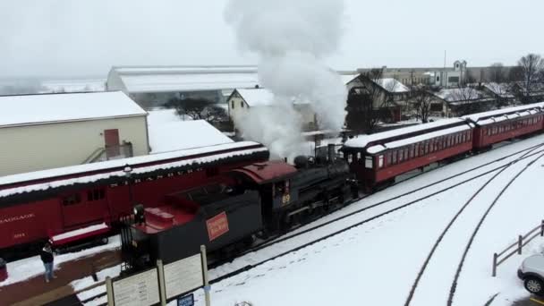 Aerial Restored Steam Engine Pulls Passenger Cars Station Snow Covered — 비디오