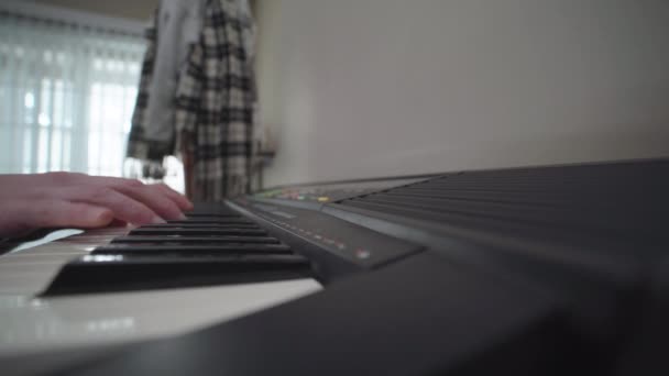 Wide Angle Sliding Shot Hands Practicing Keyboard Home — ストック動画