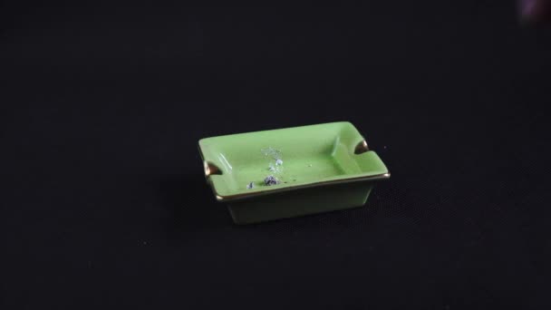 Smoking Ashing Rolled Cigarette Joint Legalised Marijuana Green Ashtray — Vídeos de Stock