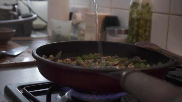 Chef Pouring Wine Sauteed Vegetables — стоковое видео